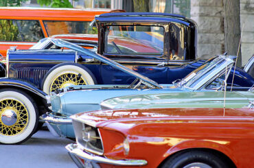 Classic cars parked along street